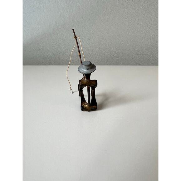 Handcrafted Metal Fishing Figure Sculpture Art made from Recycled Materials - Picture 2 of 4